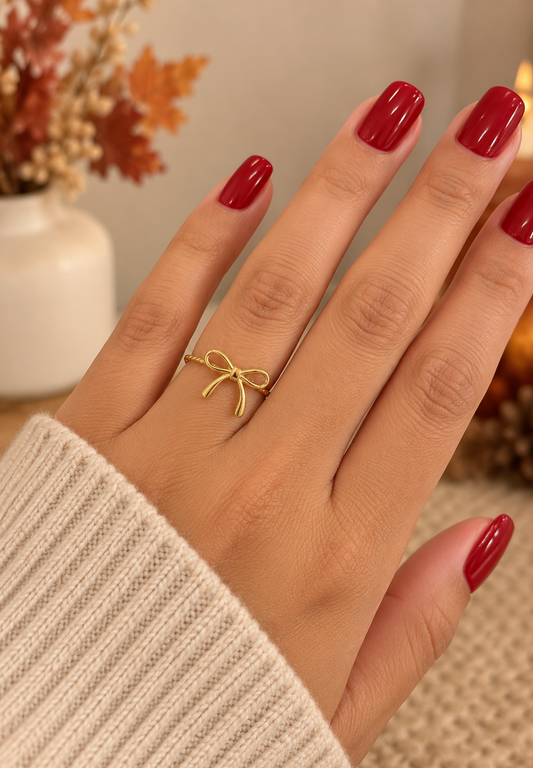 Anillo dorado con lazo